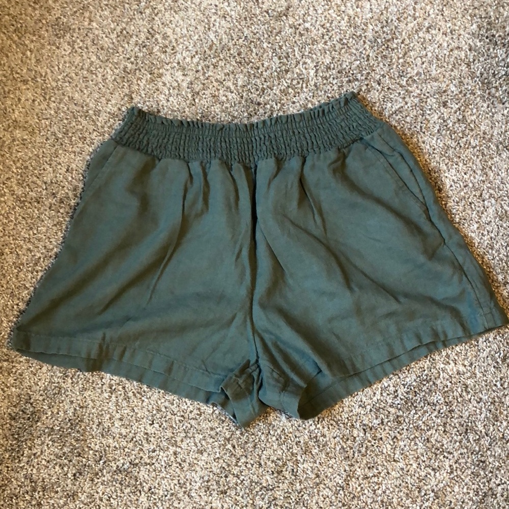 Green universal threads shorts. Size small.